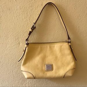 Mini yellow dooney and Bourke purse